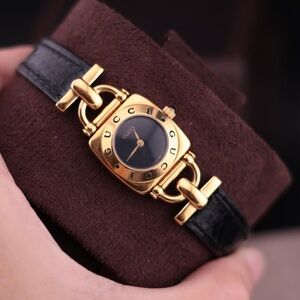 Gucci Gold and Black Women's Watch
